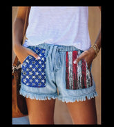 Short en jean taille haute avec cordon de serrage et pompons
